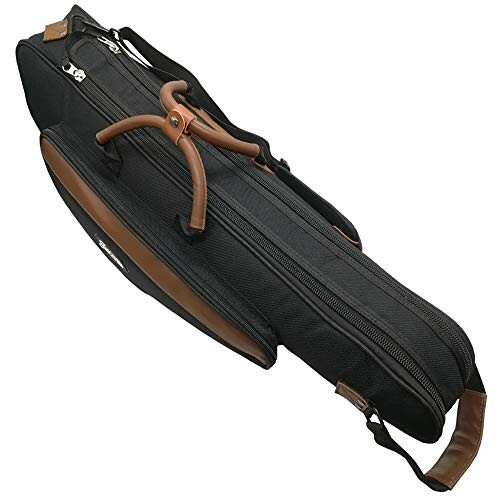 Black guitar case with brown handles