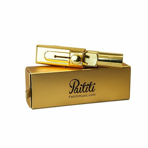 Gold tuning fork with box labeled 'Paititi'