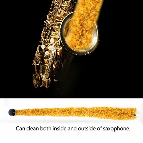 Saxophone with a cleaning brush showing usage.