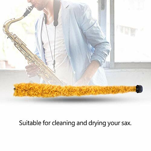 Person playing saxophone with a cleaning brush in foreground.