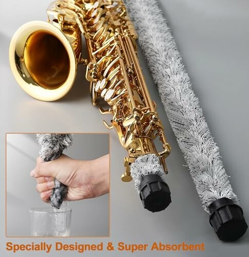 Saxophone with cleaning swab and absorbency demonstration